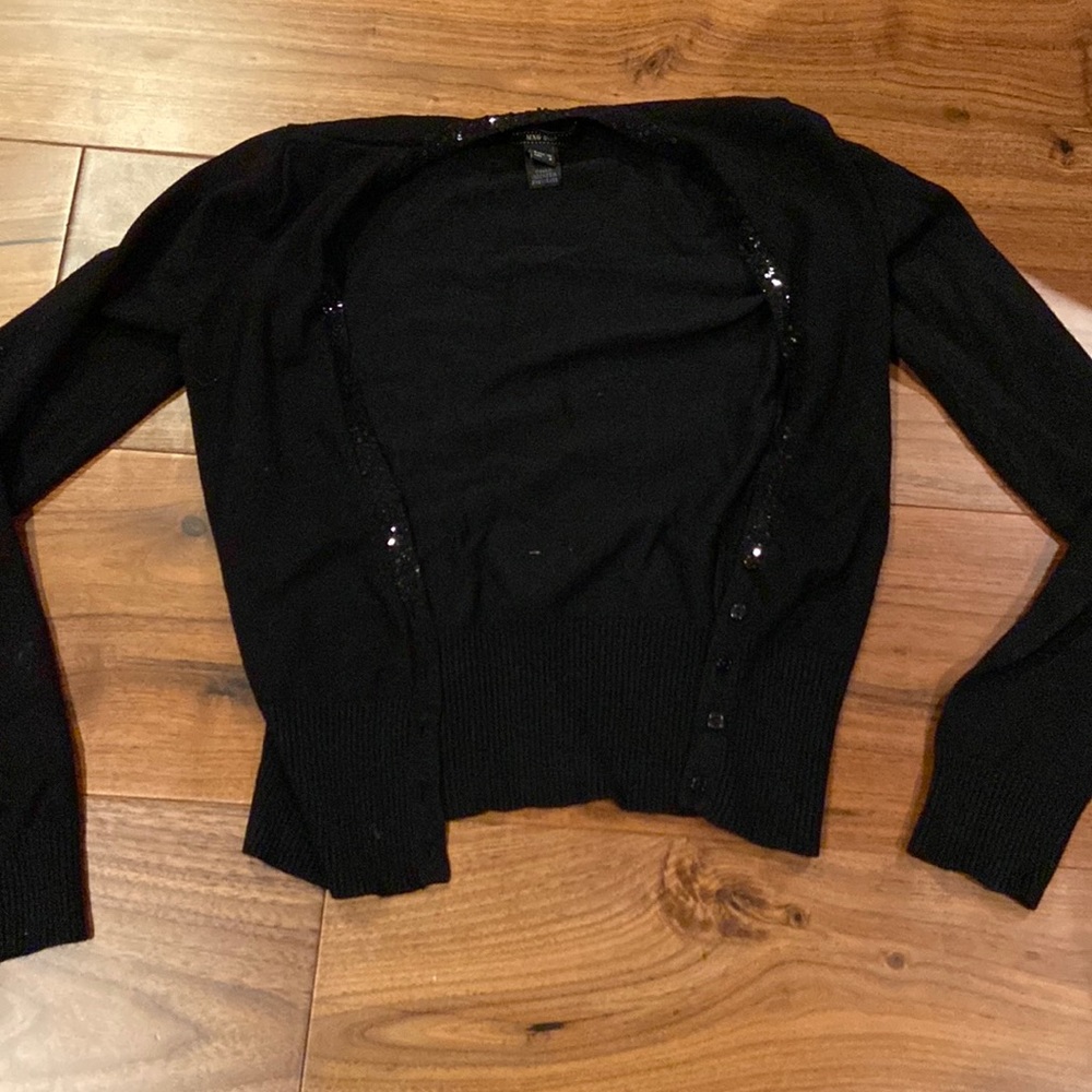 black cardigan trimmed with sequins